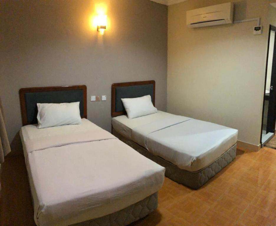 Hotel Perdana Lawas Bagian luar foto
